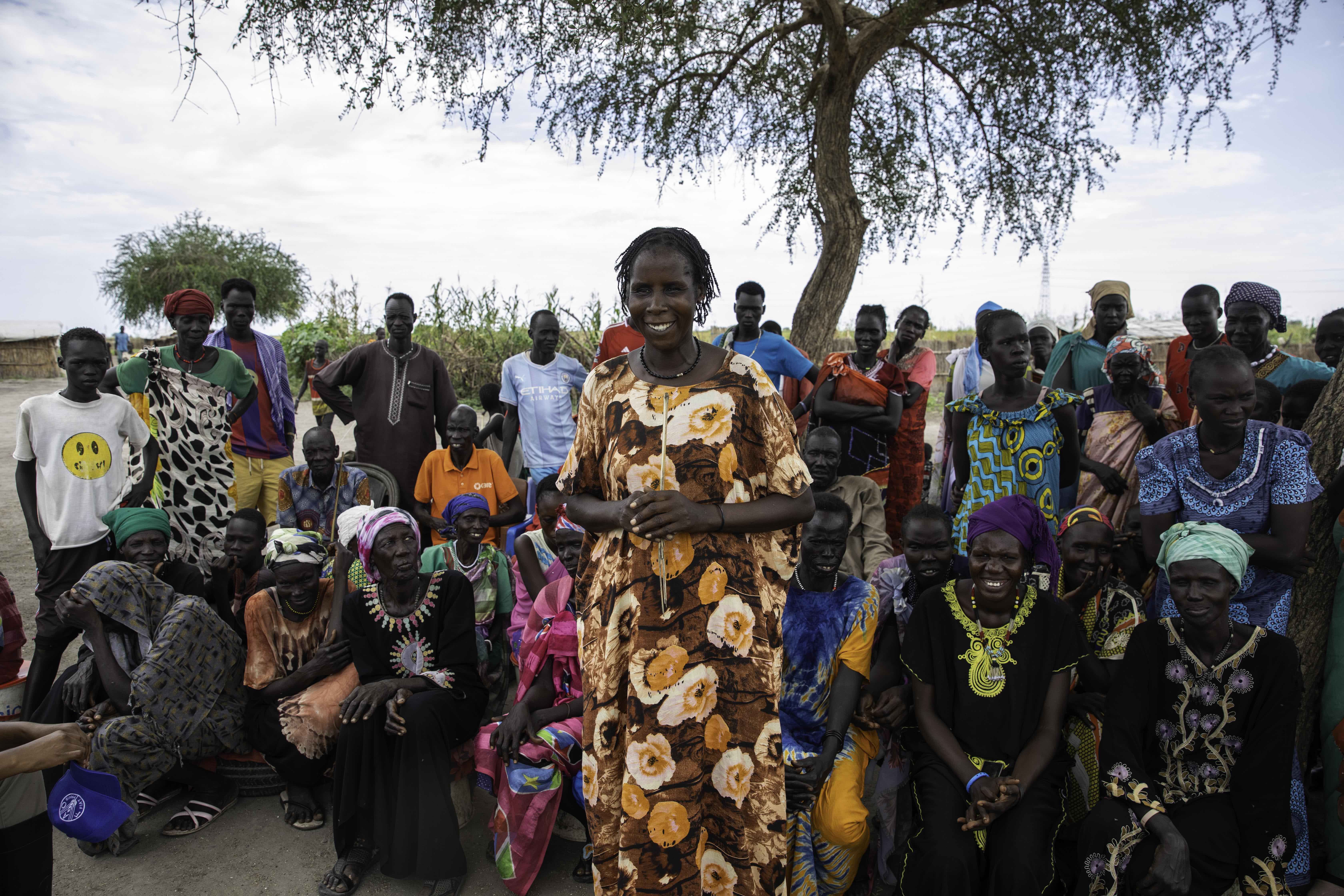 Mary Nyakan Chok, stands with other members of the Yoi Nhial Farmers Group in Rubkona County. Photo credit: FAO/Mayak Akuot