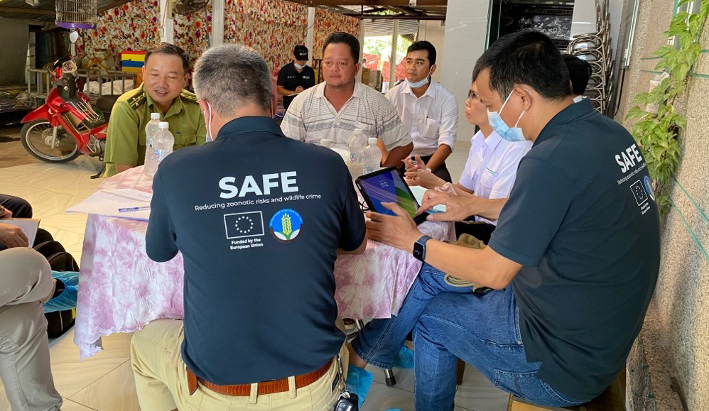 The joint team interviews facility owners in Viet Nam. ©FAO