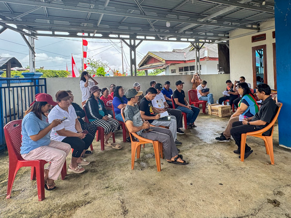 Group of people sitting in an FGD