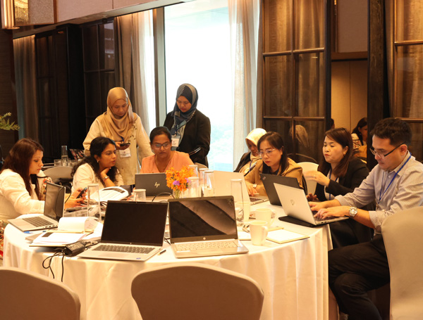 People around the table working