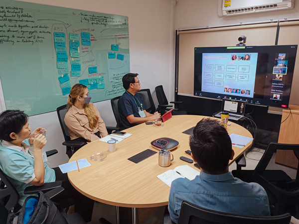 People looking at a screen