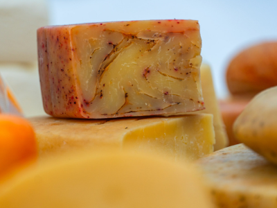 Smallholder woman farmer flourishing with innovative cheesemaking and modern dairy production practices in Georgia